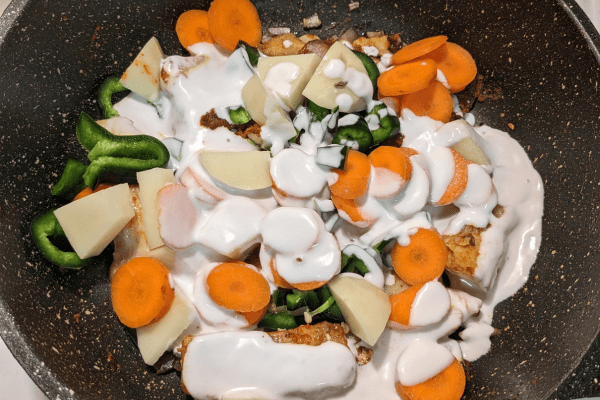 coconut milk with veggies on a pan