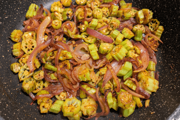 ladies finger or okra stir fry on a pan